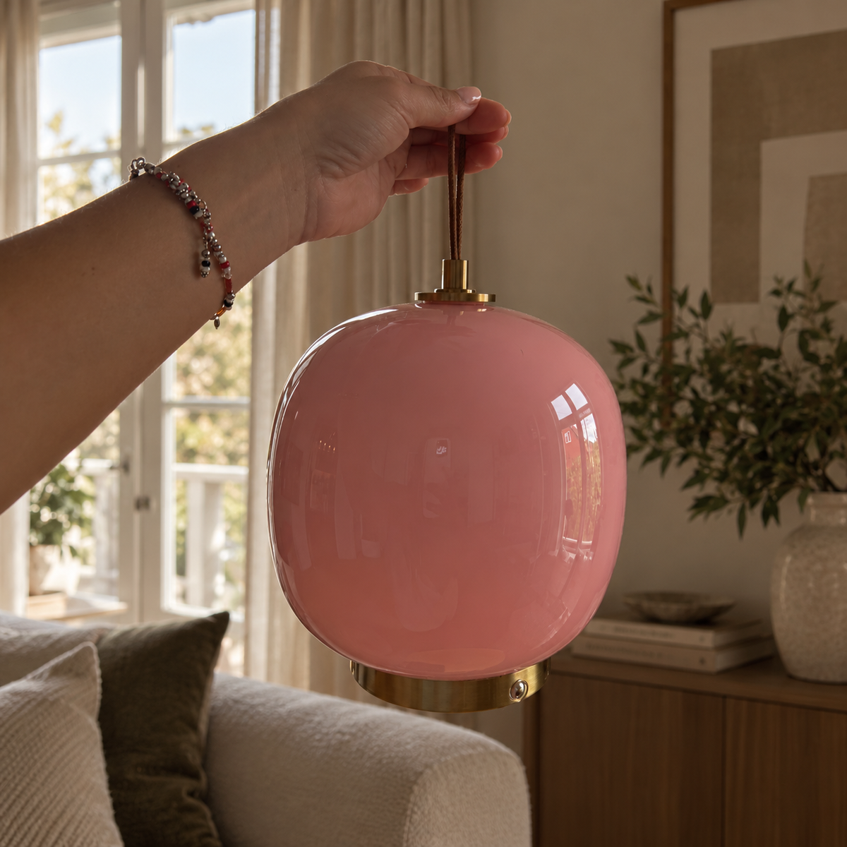 Håndholdt lampe til å henge en lampe