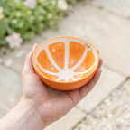 Fin liten appelsindesignet bolle i oransje. 