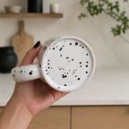 Undersiden av unik kaffekopp