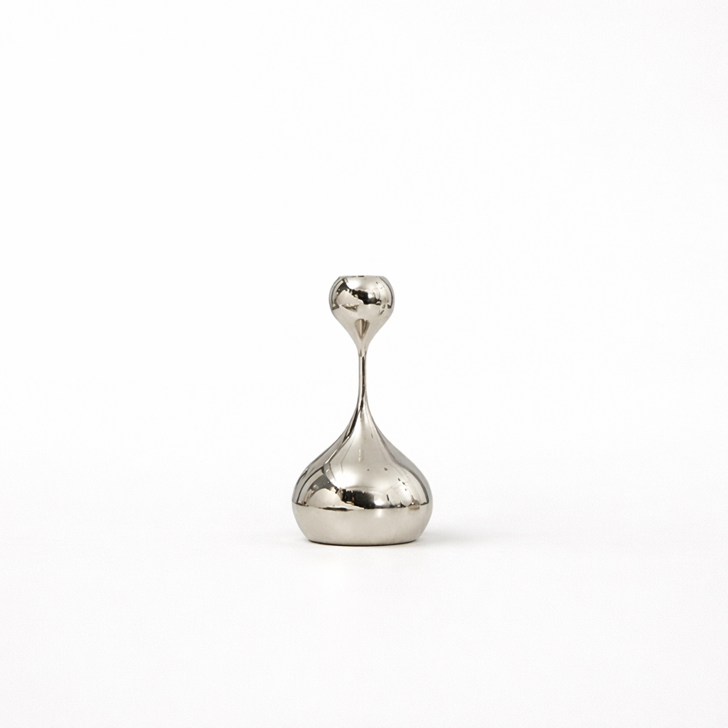 Lysestake i Rustfritt Stål – Skulpturell Form