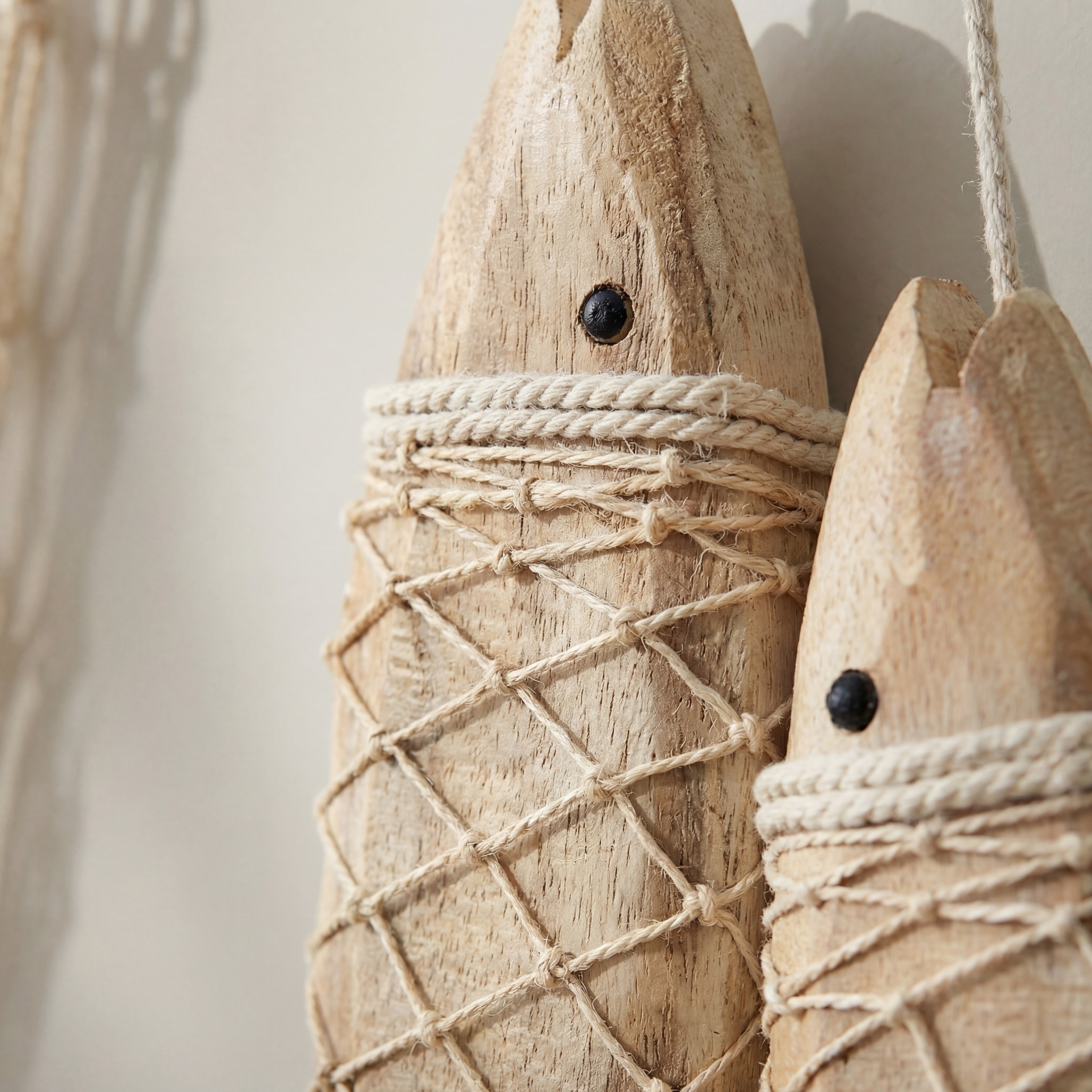 Detaljer på figur fiskene i et hyggelig rom. 