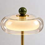 Bordslampa i glas och metall med grön fot