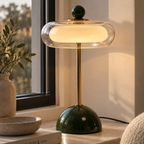 Bordslampa i glas och metall med grön fot