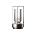 En LED oppladbar lampe til ute og innebruk i sølv.