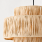 Handmade pendelllamp in wicker in a nice white studio. 