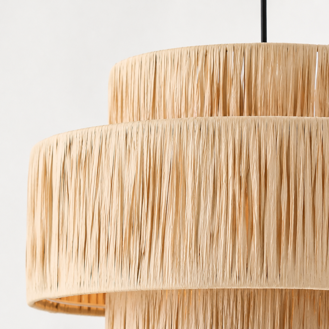 Handmade pendelllamp in wicker in a nice white studio. 